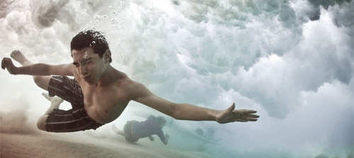 Stunning Underwater Photos of People Fighting Against the Ocean